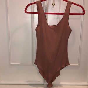 Blush Ruffle ended Bodysuit